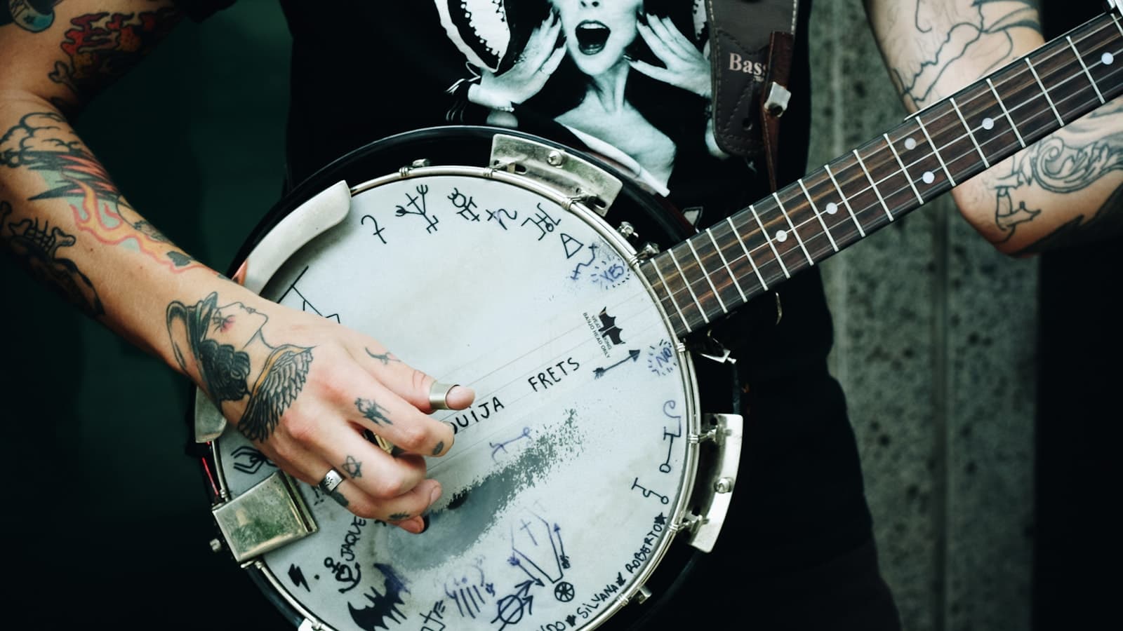 Close-up of a musician playing a banjo