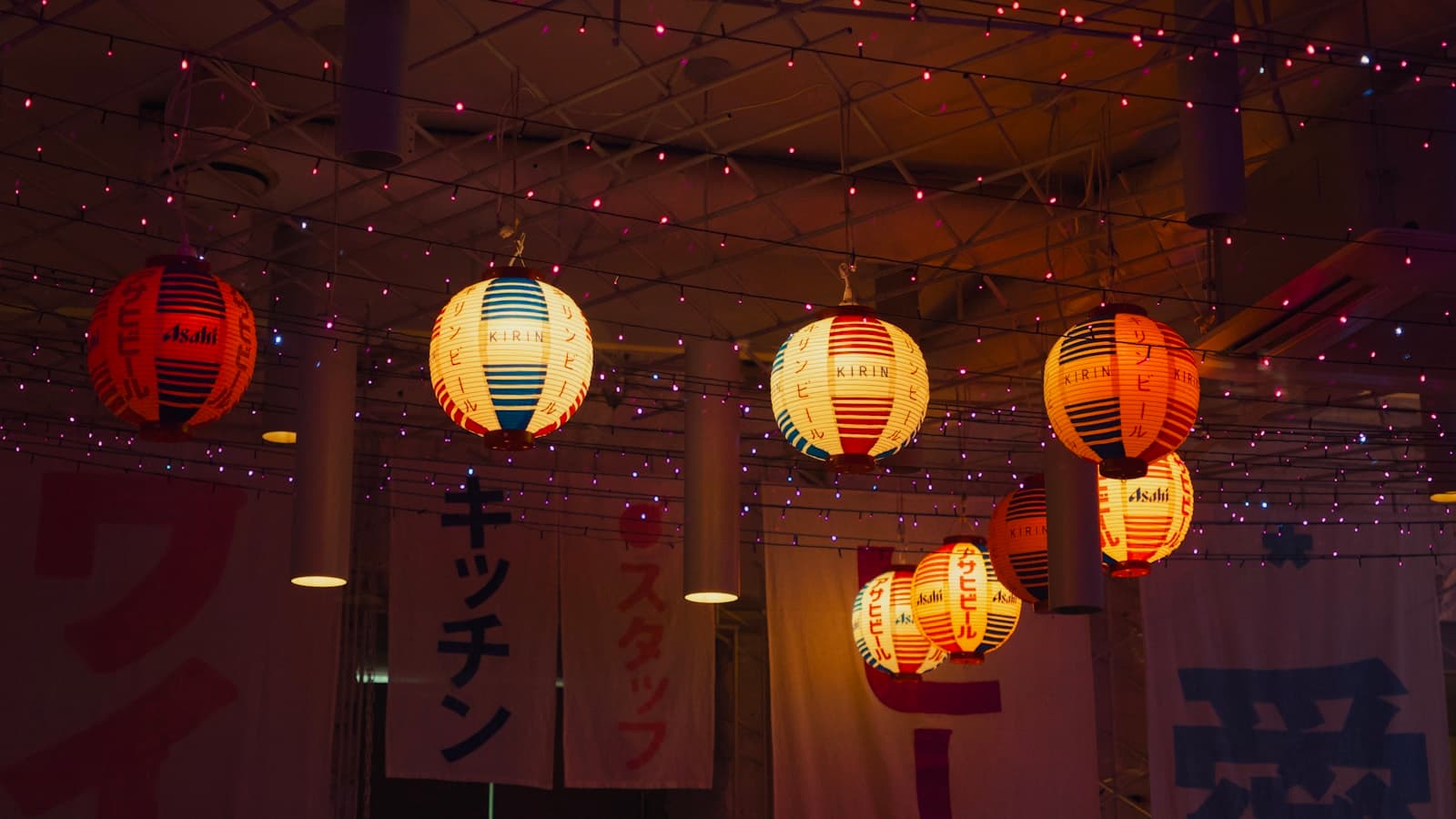 Paper lanterns glowing at night